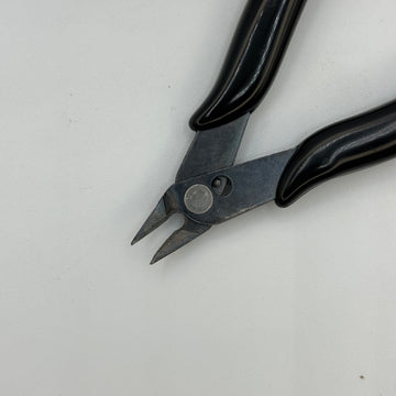 Capsule and Hair Cutter