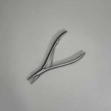 Щипцы для удаления нарощенных волос с текстурированной поверхности